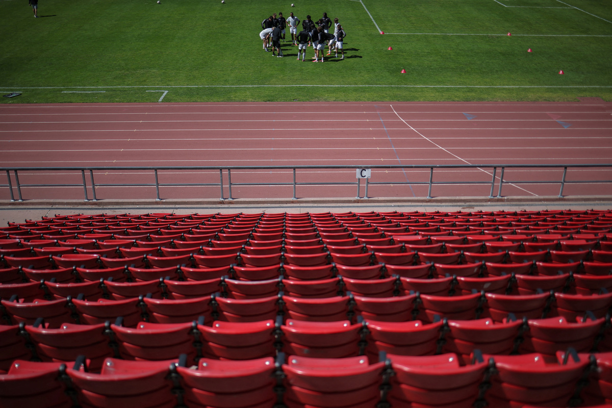 FC Davis players listen to their coach before a game against San Francisco City FC at the Kezar Stadium in San Francisco, California, U.S., May 17, 2026. REUTERS/Carlos Barria