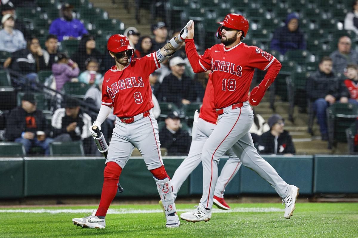  Apr 27, 2026; Chicago, Illinois, USA; Los Angeles Angels first baseman Nolan Schanuel (18) celebrates with shortstop Zach Neto (9) after scoring against the Chicago White Sox during the second inning at Rate Field. Mandatory Credit: Kamil Krzaczynski-Imagn Images