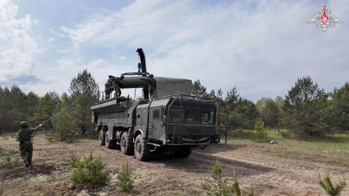 Service members mount a missile on a Russian Iskander-M missile launcher during nuclear forces exercises at an unidentified location in Belarus, in this still image taken from handout footage released on May 21, 2026. Russian Defence Ministry/Handout via REUTERS
