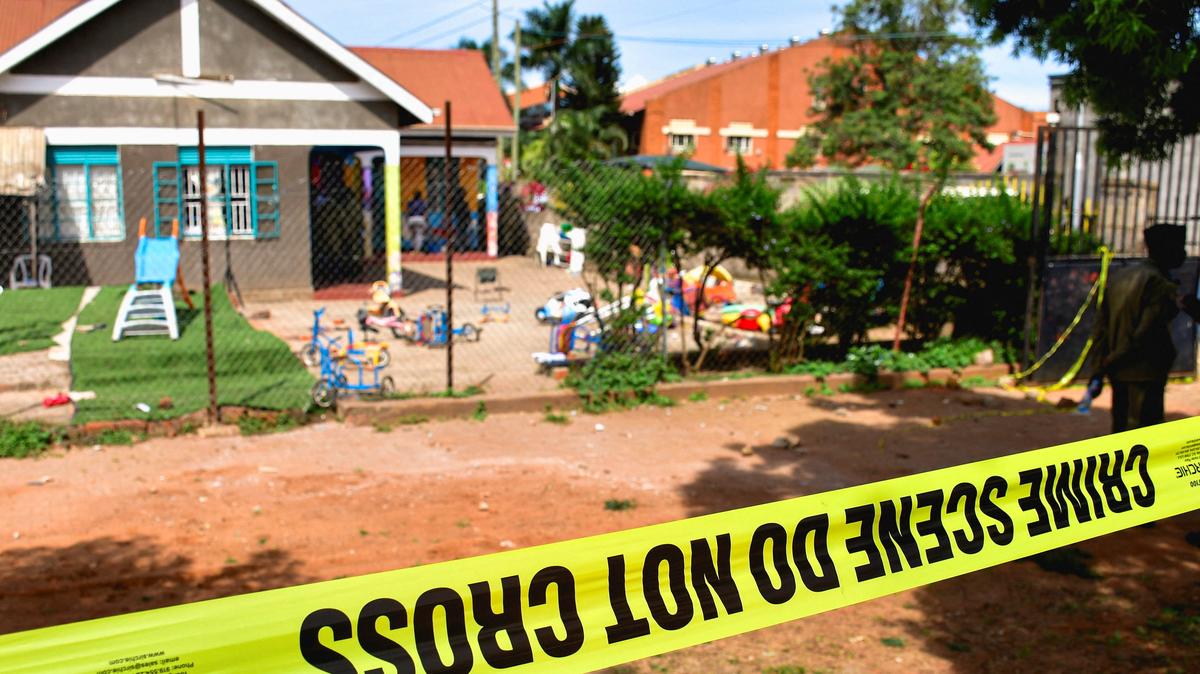 Police tape at the scene after a man posing as a parent stabbed and killed children at a school in Kampala, Uganda, April 2, 2026. REUTERS/Abubaker Lubowa