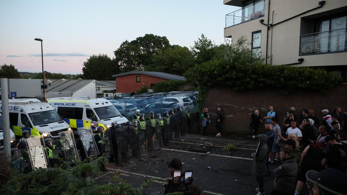 UK police under pressure after dying student was handcuffed