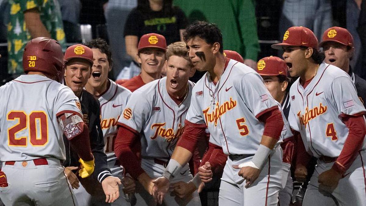  USC celebrates a home run by Isaac Cadena (20) as the Oregon Ducks host the USC Trojans on May 14, 2026, in Eugene, Oregon. | Ben Lonergan/The Register-Guard / USA TODAY NETWORK via Imagn Images 