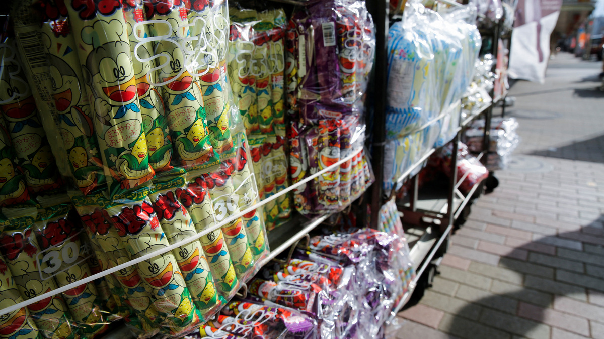 Several flavours of corn snack are displayed at a confectionery wholesaler's in Tokyo, Japan January 25, 2022. REUTERS/Akira Tomoshige/File Photo