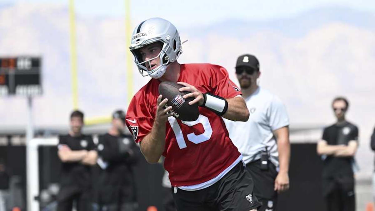  May 2, 2026; Henderson, NV, USA; Las Vegas Raiders quarterback Fernando Mendoza (15) runs through a drill during a Rookie Minicamp at Intermountain Health Performance Center. Mandatory Credit: Candice Ward-Imagn Images | Candice Ward-Imagn Images 