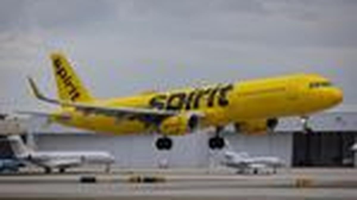 FILE PHOTO: A Spirit Airlines flight arrives at Fort Lauderdale - Hollywood International Airport, in Fort Lauderdale, Florida, U.S., April 23, 2026. REUTERS/Marco Bello/File Photo