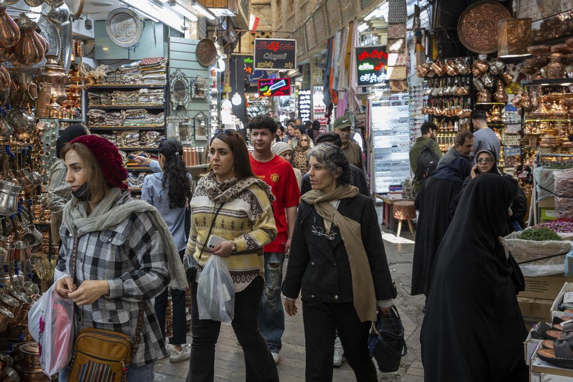 People shop at the Tajrish Bazaar in Tehran, on Thursday, April 16, 2026. President Donald Trump told reporters at the White House that the next in-person negotiations with Iran might occur this weekend. (Arash Khamooshi/The New York Times)