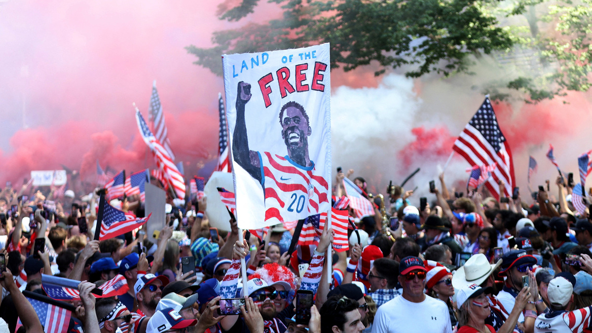 Soccer Football - FIFA World Cup 2026 - Round of 16 - United States v Belgium - Fans gather in Seattle - Seattle, Washington, U.S. - July 6, 2026 United States fans gather before the match with a Folarin Balogun banner in Seattle IMAGN IMAGES via Reuters/Kevin Ng