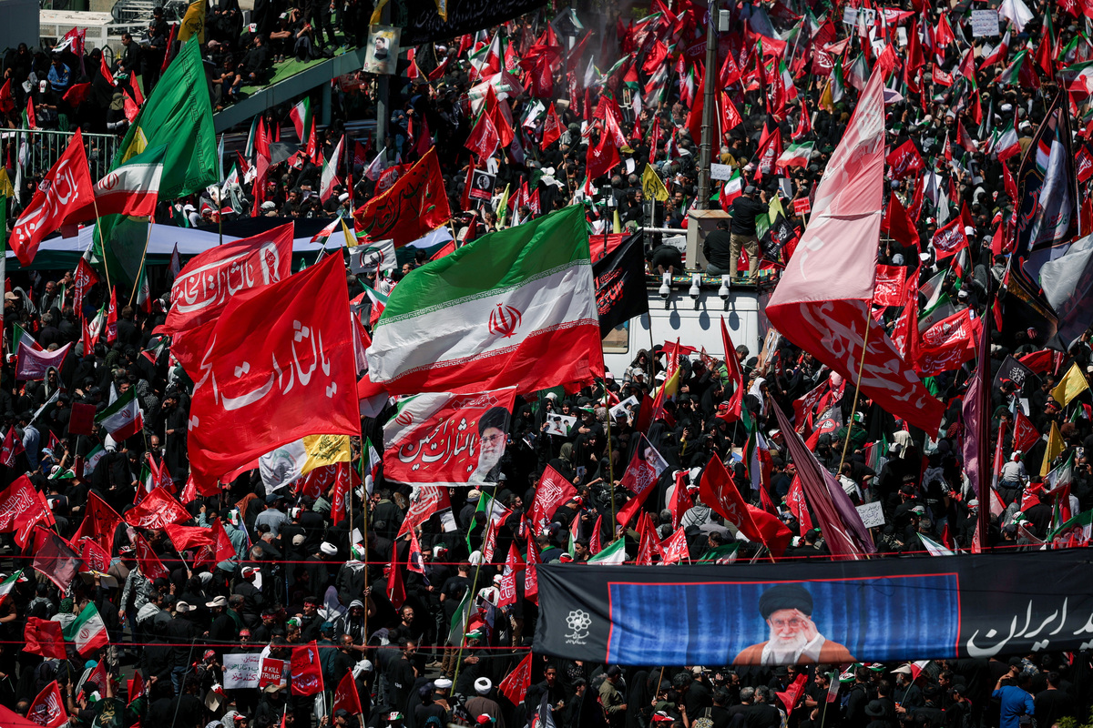 Mourners gather on the day of the burial of Iran's late Supreme Leader Ayatollah Ali Khamenei, who was killed on February 28 in Israeli and U.S. airstrikes, in Mashhad, Iran, July 9, 2026. REUTERS/Alkis Konstantinidis