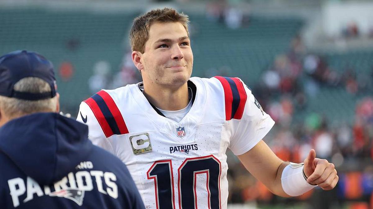  Nov 23, 2025; Cincinnati, Ohio, USA; New England Patriots quarterback Drake Maye (10) reacts after defeating the Cincinnati Bengals at Paycor Stadium. Mandatory Credit: Joseph Maiorana-Imagn Images | Joseph Maiorana-Imagn Images 