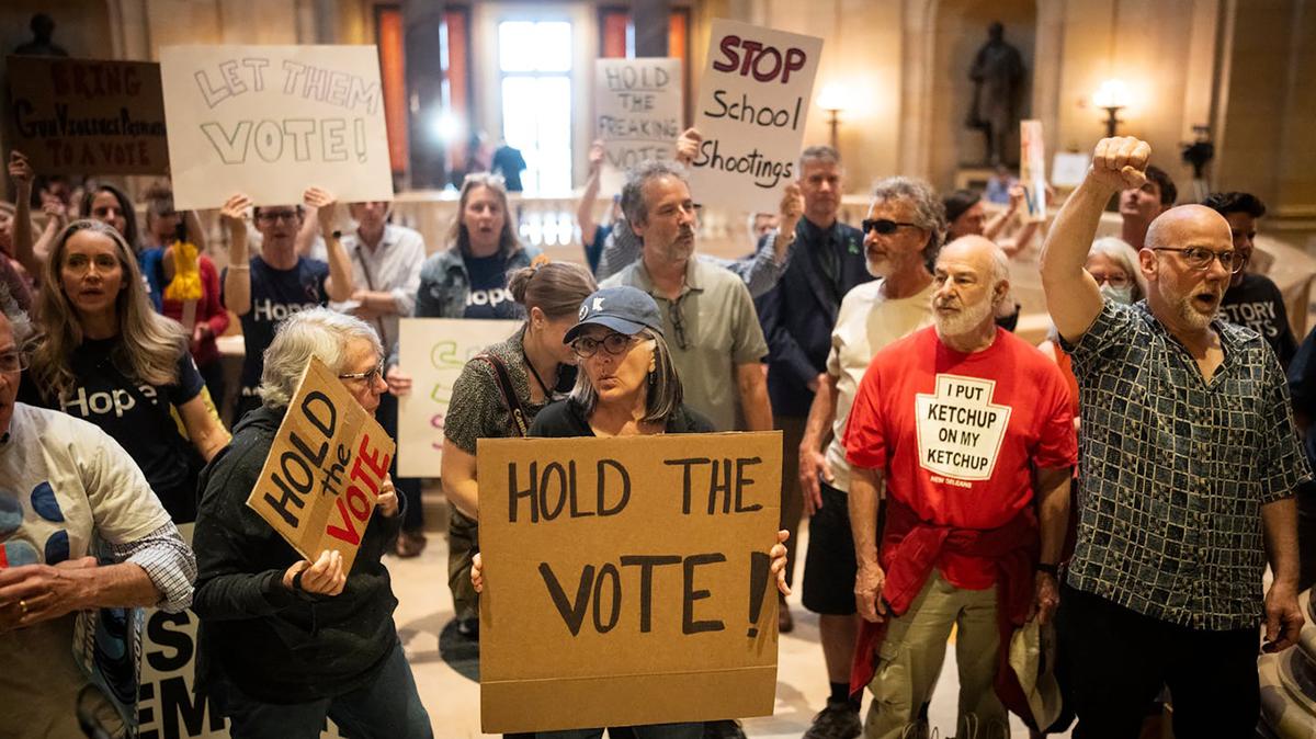 Protesters upset that gun-control measures haven't made it to the House floor for a vote chant outside the House chambers at the State Capitol on May 14, 2026, in St. Paul, Minnesota. (Renee Jones Schneider/The Minnesota Star Tribune/TNS)
