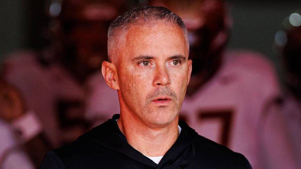Nov 29, 2025; Gainesville, Florida, USA; Florida State Seminoles head coach Mike Norvell walks out of the tunnel before a game against the Florida Gators at Ben Hill Griffin Stadium. Mandatory Credit: Matt Pendleton-Imagn Images. 