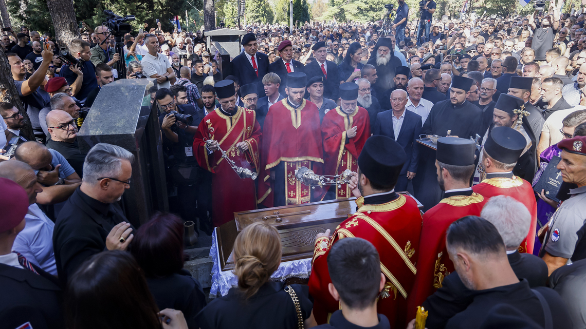 Thousands attend funeral of war criminal Mladic in Serbia