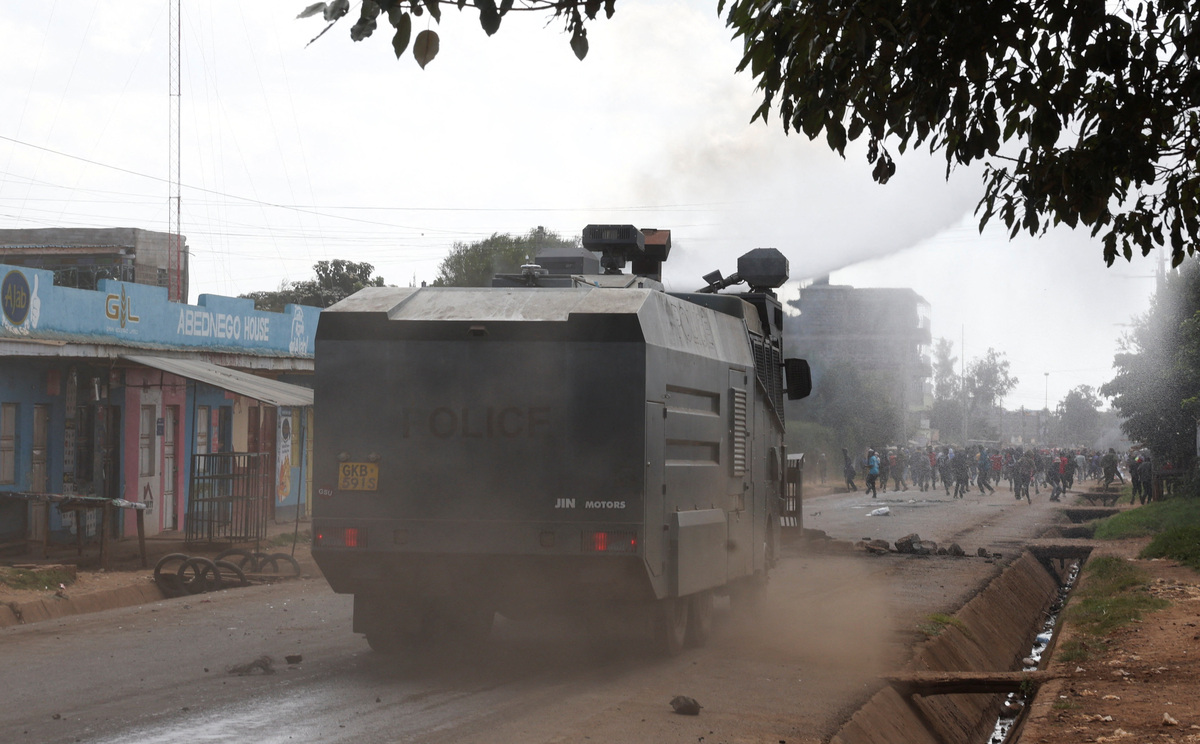 Riot police officers use a water cannon to disperse demonstrators in a protest against a U.S.-backed Ebola quarantine plan to establish a 50-bed facility at a Kenyan air force base intended to host Americans exposed to Ebola, in Nanyuki town, Laikipia County, Kenya, June 9, 2026. REUTERS/Monicah Mwangi