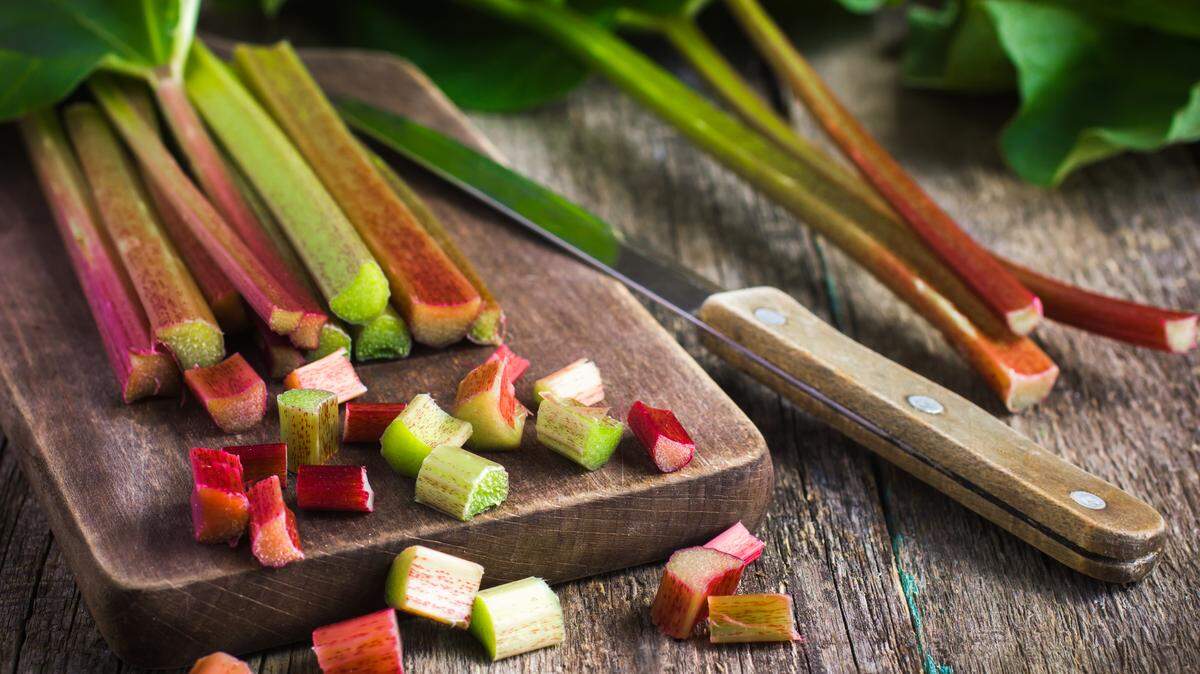 To prepare rhubarb, thoroughly wash the stalks in water and trim off ends and leaves (which are poisonous!) so you’re left with just the stalks. Peel away any brown spots and coarse strings, but you don’t need to peel the entire stalk before cutting it into chunks.