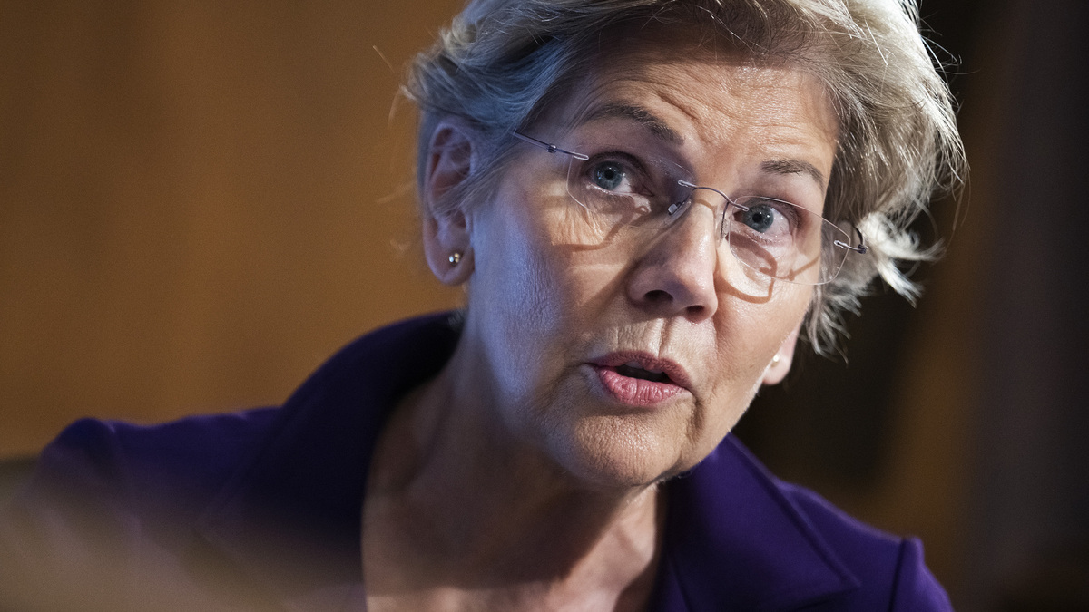 U.S. Sen. Elizabeth Warren, D-Mass., questions U.S. Federal Reserve Chair Jerome Powell as he testifies at a Senate Banking, Housing, and Urban Affairs Committee hearing on the Fed's "Semiannual Monetary Policy Report to the Congress," on Capitol Hill on March 3, 2022, in Washington, D.C. (Tom Williams/Pool/Getty Images/TNS)