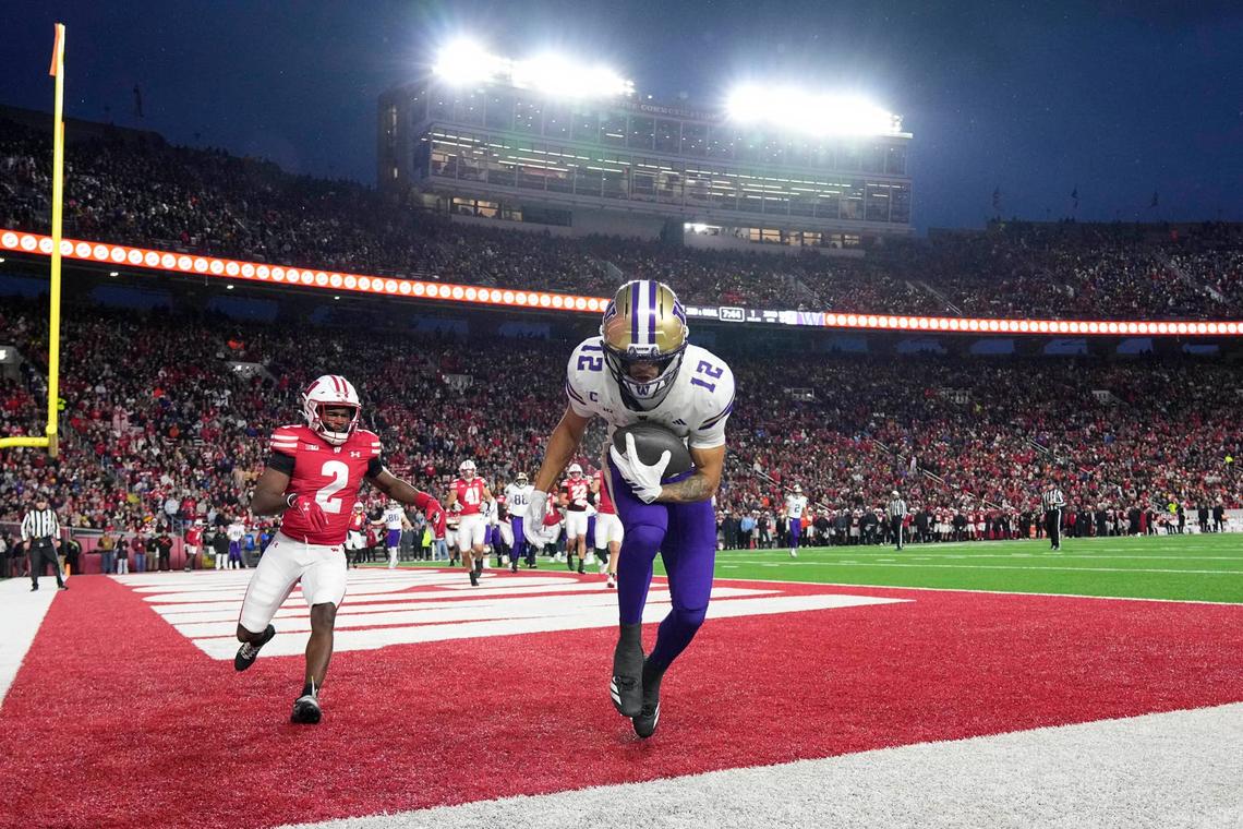  Nov 8, 2025; Madison, Wisconsin, USA; Washington Huskies wide receiver Denzel Boston (12) catches a pass to score a touchdown during the second quarter against the Wisconsin Badgers at Camp Randall Stadium. Mandatory Credit: Jeff Hanisch-Imagn Images 