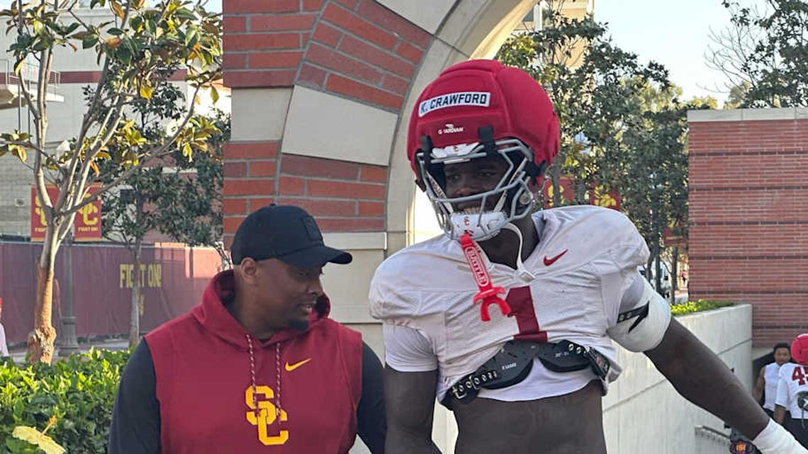  USC Trojans defensive line coach Skyler Jones and defensive end Kameryn Crawford | USC Trojans on SI 