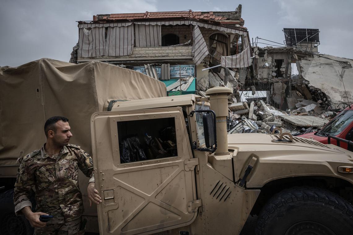 A Lebanese soldier steps from a military vehicle in the ruins of Tebnine, Lebanon, April 18, 2026. (David Guttenfelder/The New York Times)
