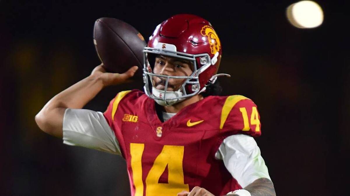  Nov 7, 2025; Los Angeles, California, USA; Southern California Trojans quarterback Jayden Maiava (14) throws against the Northwestern Wildcats during the second half at the Los Angeles Memorial Coliseum. Mandatory Credit: Gary A. Vasquez-Imagn Images | IMAGN IMAGES via Reuters Connect 