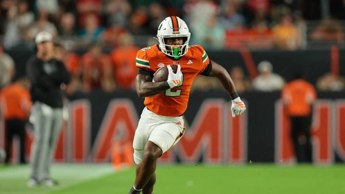  Oct 17, 2025; Miami Gardens, Florida, USA; Miami Hurricanes running back Jordan Lyle (2) carries the football against the Louisville Cardinals during the fourth quarter at Hard Rock Stadium. Mandatory Credit: Sam Navarro-Imagn Images | IMAGN IMAGES via Reuters Connect 