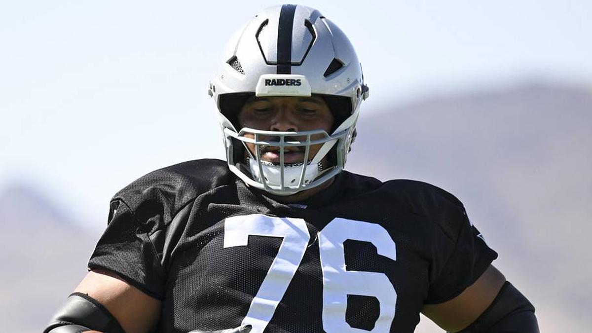  May 20, 2026; Henderson, NV, USA; Las Vegas Raiders guard Caleb Rogers (76) warms up during organized team activities at Intermountain Health Performance Center. Mandatory Credit: Candice Ward-Imagn Images | Candice Ward-Imagn Images 