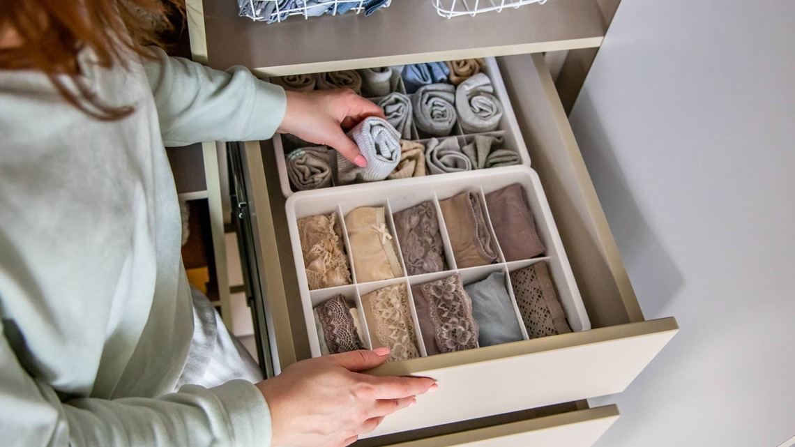 Woman Turns Old Gift Bags Into $0 Clothing Organizers 