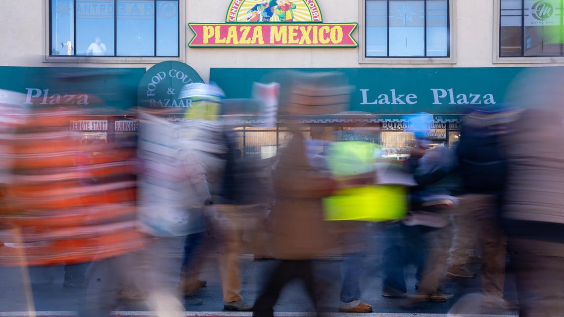 Protesters march past Plaza Mexico during a December 2025 anti-ICE protest on Lake Street in Minneapolis. Several of Minnesota’s largest companies are funding $3.5 million in grants for small businesses that are financially struggling during the ongoing federal immigration crackdown in the state.