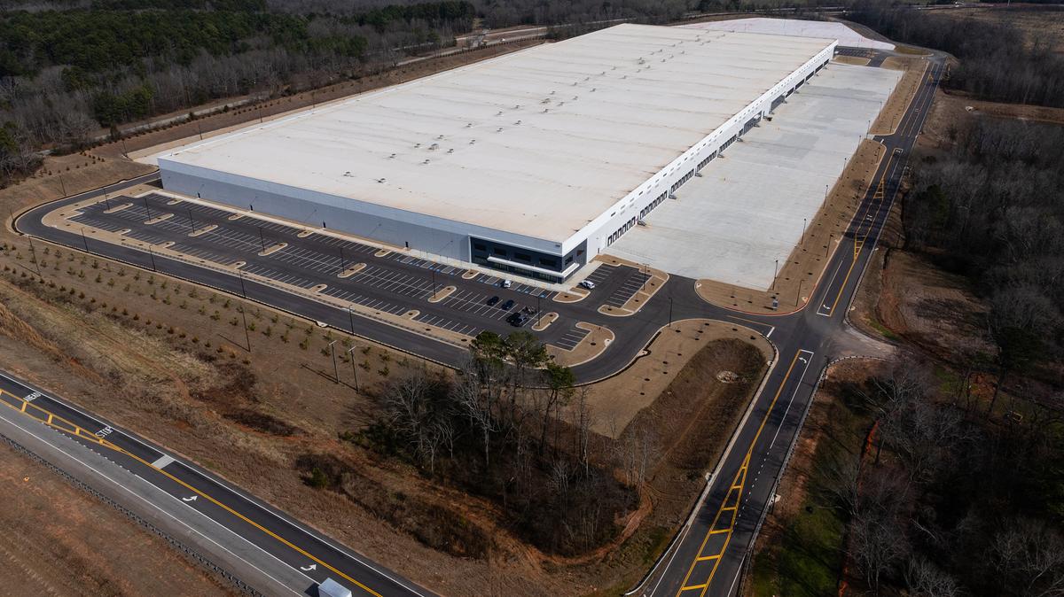 An industrial warehouse recently purchased by Immigration and Customs Enforcement (ICE) for use as a detention center is seen on Feb. 10, 2026, in Social Circle, Georgia. Immigrant detention centers are not only cruel, they are costly.