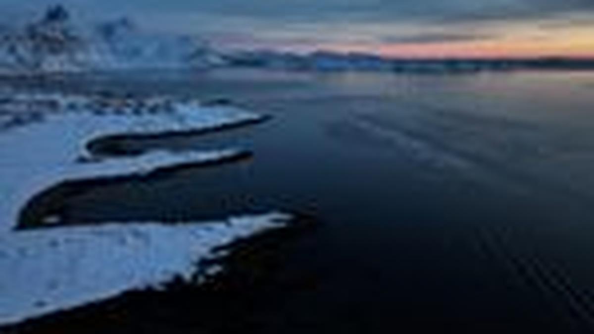 FILE PHOTO: A drone view shows a boat sailing on the shores of Nuuk, Greenland, February 7, 2026. REUTERS/Stoyan Nenov/File Photo