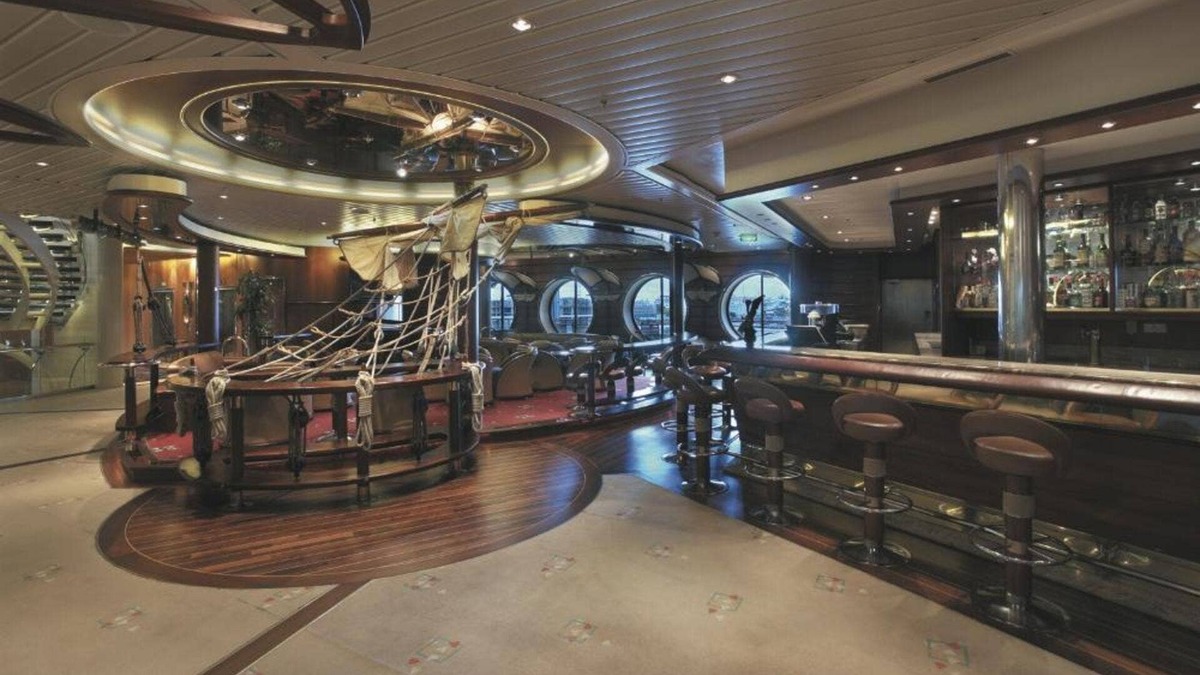  Some loyal cruisers prefer the traditional, nautical feel of Royal Caribbean's signature Schooner Bar on its older ships. 