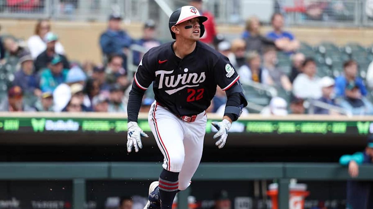 Minnesota Twins shortstop Brooks Lee (22) hits a single against the Seattle Marinersa during the eighth inning at Target Field. | Matt Krohn-Imagn Images 