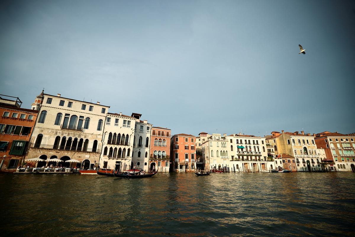 FILE PHOTO: A general view of the Grand Canal ahead of the expected wedding of Amazon founder Jeff Bezos and Lauren Sanchez, in Venice, Italy, June 23, 2025. REUTERS/Yara Nardi/File Photo