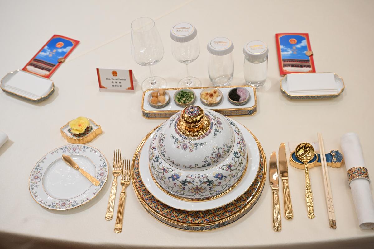Dishes set at a state banquet for President Donald Trump and President Xi Jinping, at the Great Hall of the People in Beijing on Thursday, May 14, 2026. Crispy beef ribs, roast duck and tiramisu were on the menu Thursday at the state dinner, as Chinese chefs sought to appeal to Trump's culinary preferences while using traditional ingredients and cooking techniques. (Kenny Holston/The New York Times)..