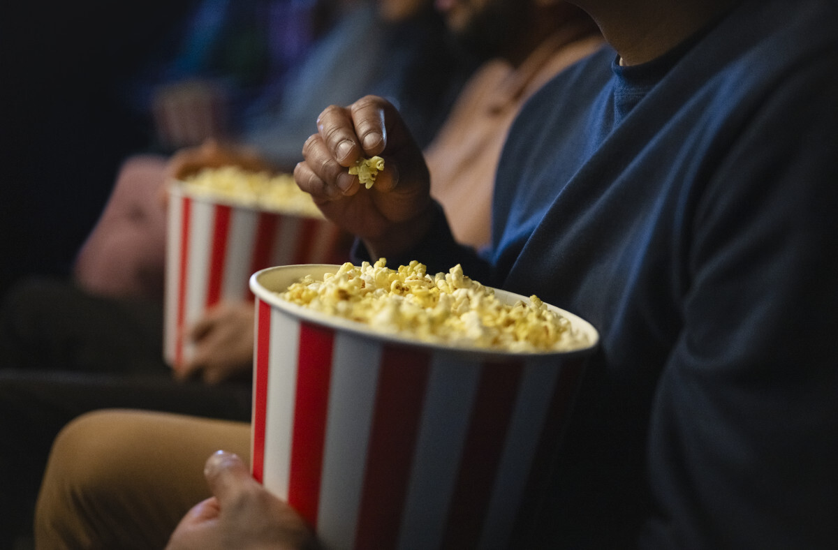 Movie.goers eat popcorn
