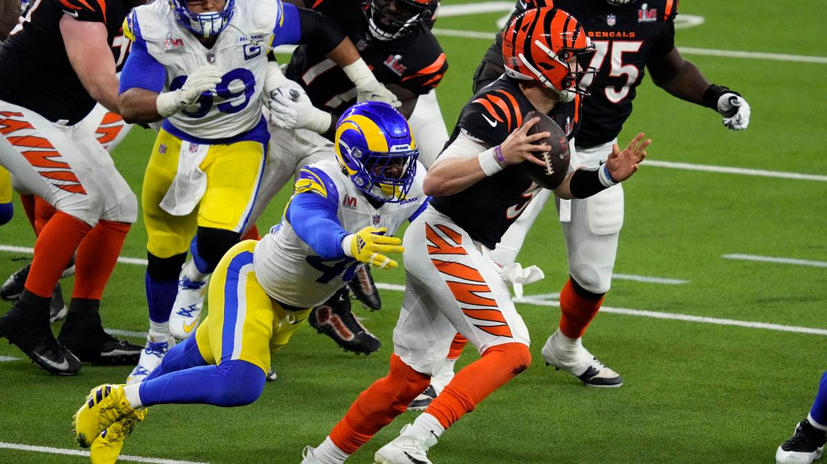 Los Angeles Rams outside linebacker Von Miller (40) prepares to sack Cincinnati Bengals quarterback Joe Burrow (9) during the second half of the NFL Super Bowl 56 football game Sunday, Feb. 13, 2022, in Inglewood, Calif. (AP Photo/Julio Cortez)
