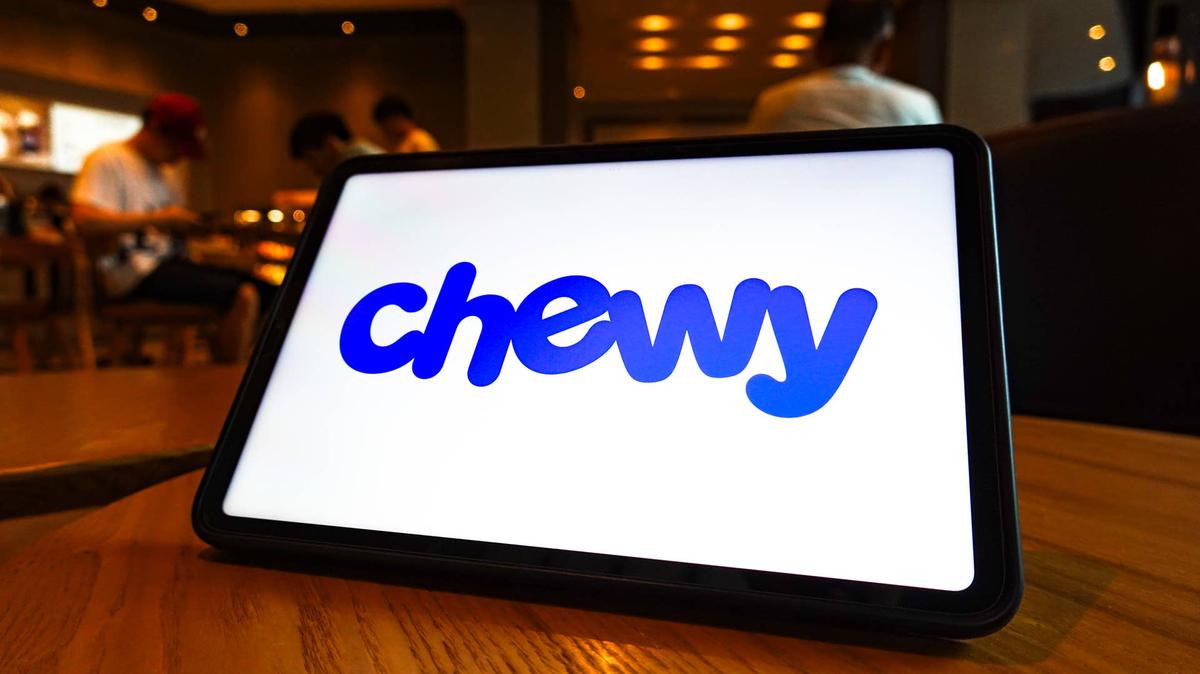 Chewy logo is displayed on the screen of a tablet.