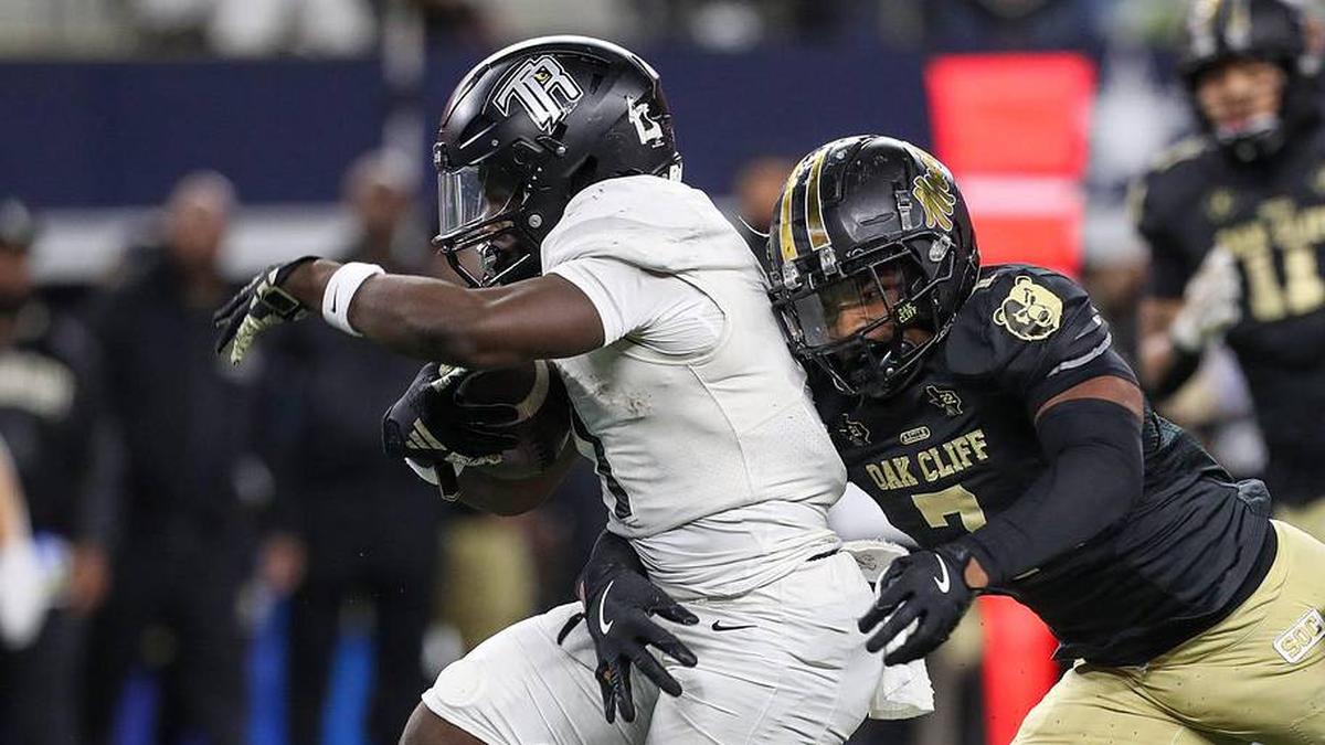  South Oak Cliff's Jamarion Phillips tackles Richmond Randle's Landen Williams-Callis during the Class 5A, Division II State Championship game on Friday, Dec. 20, 2024, at AT&T Stadium in Arlington, Texas. | Angela Piazza/Caller-Times / USA TODAY NETWORK via Imagn Images 