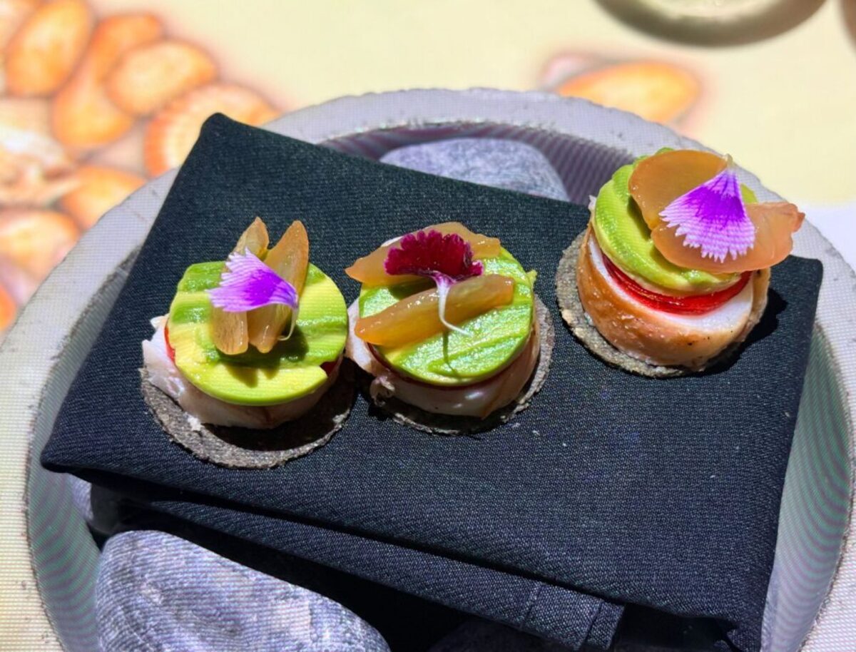  A sensory trio of lobster tacos with avocado and citrus, served during the high-energy “Awaken Your Senses” immersive dinner. Photo credit: Cristine Struble 
