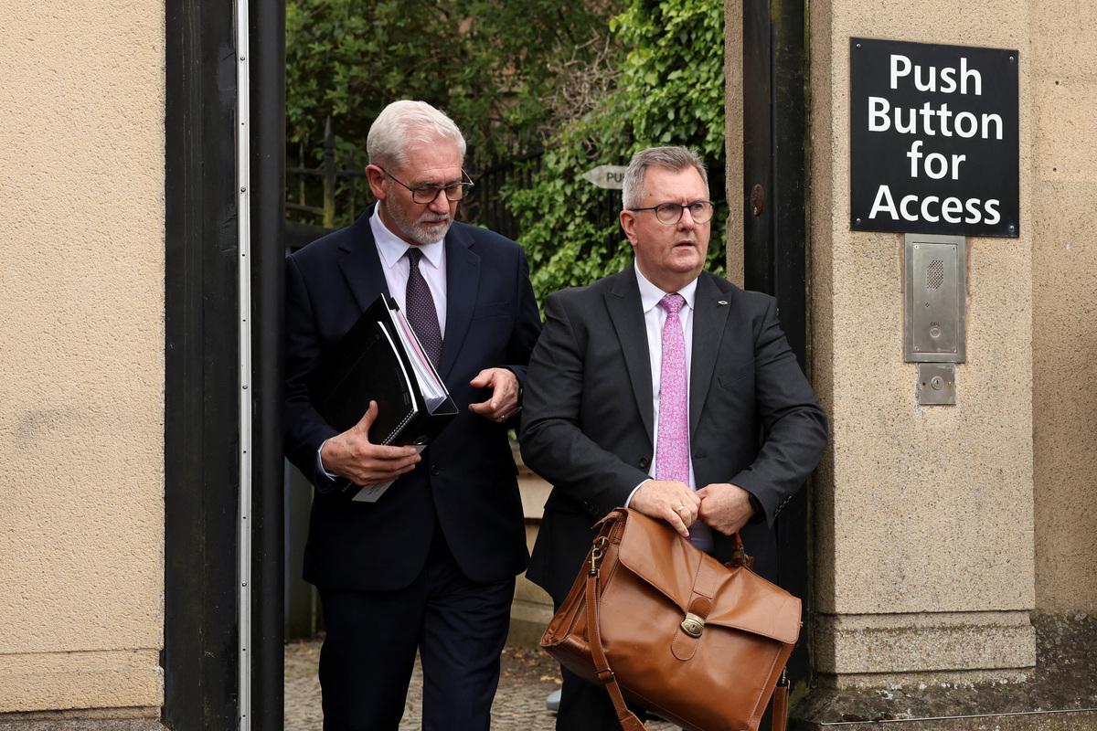 Jeffrey Donaldson, former leader of the Democratic Unionist Party (DUP), charged with historical sex offences, leaves the Newry Courthouse as he appeared for trial, in Newry, Northern Ireland, June 17, 2026. REUTERS/Cathal McNaughton