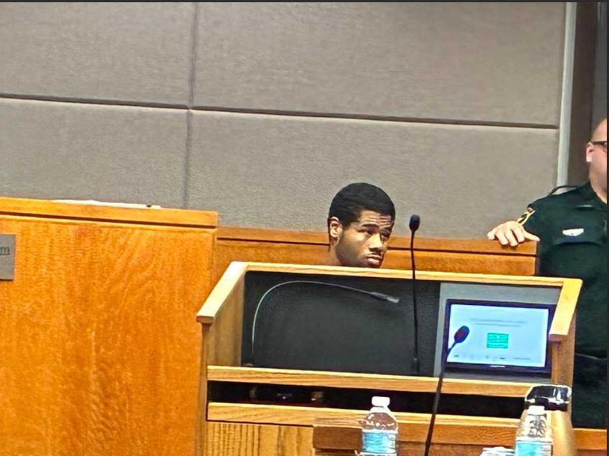 Davinci Cheesman Dawson testifies for the defense in the Dexavion J'Neil Brown murder trial on July 8.
