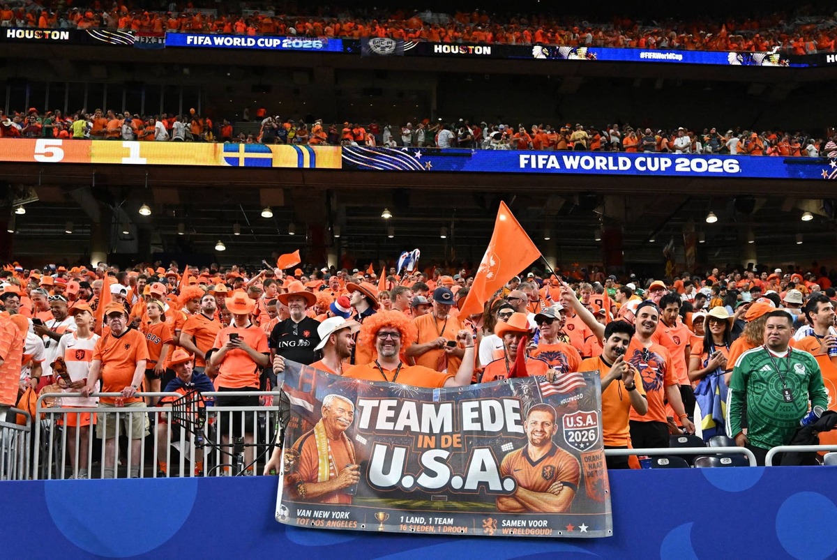  Netherlands fans celebrate after the match. 