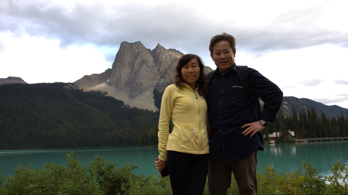 Dr. Yufang Rong and her husband Dr. Youlin Chen, an American seismologist held for nearly two years by China, pose together in this undated photograph provided on July 13, 2026. Courtesy Dr. Yufang Rong/Handout via REUTERS