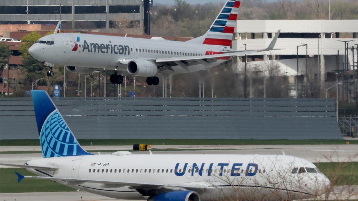 An American Airlines jet approaches the runway as a United Airlines jet taxis at O'Hare International Airport on April 14, 2026, in Chicago. (John J. Kim/Chicago Tribune/TNS)