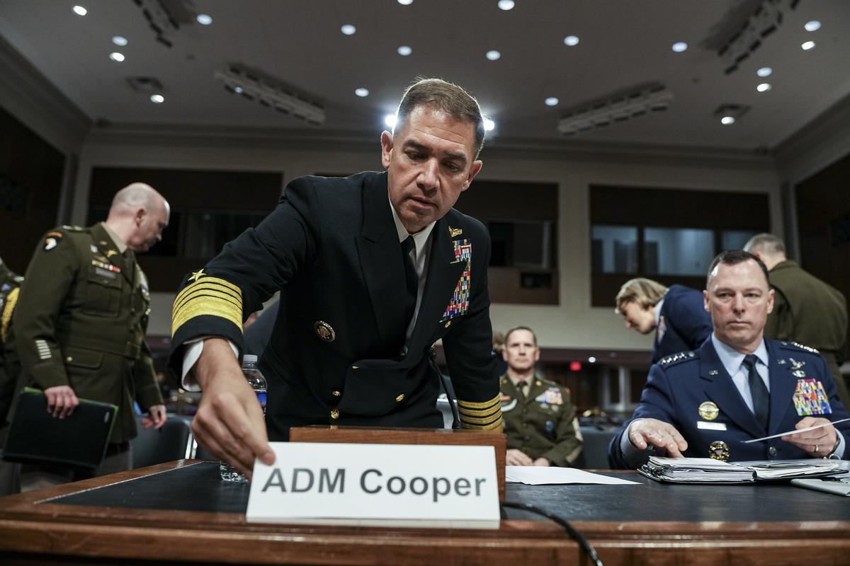 Adm. Brad Cooper, the head of U.S. Central Command, and General Dagvin Anderson, right, commander of the U.S. Africa Command, arrive to testify before the Senate Armed Services Committee on Capitol Hill in Washington, on Thursday, May 14, 2026. Cooper, whose command covers the Middle East, is appearing before lawmakers as the Strait of Hormuz remains largely closed and efforts to reach a lasting deal with Iran have made little progress. (Haiyun Jiang/The New York Times)