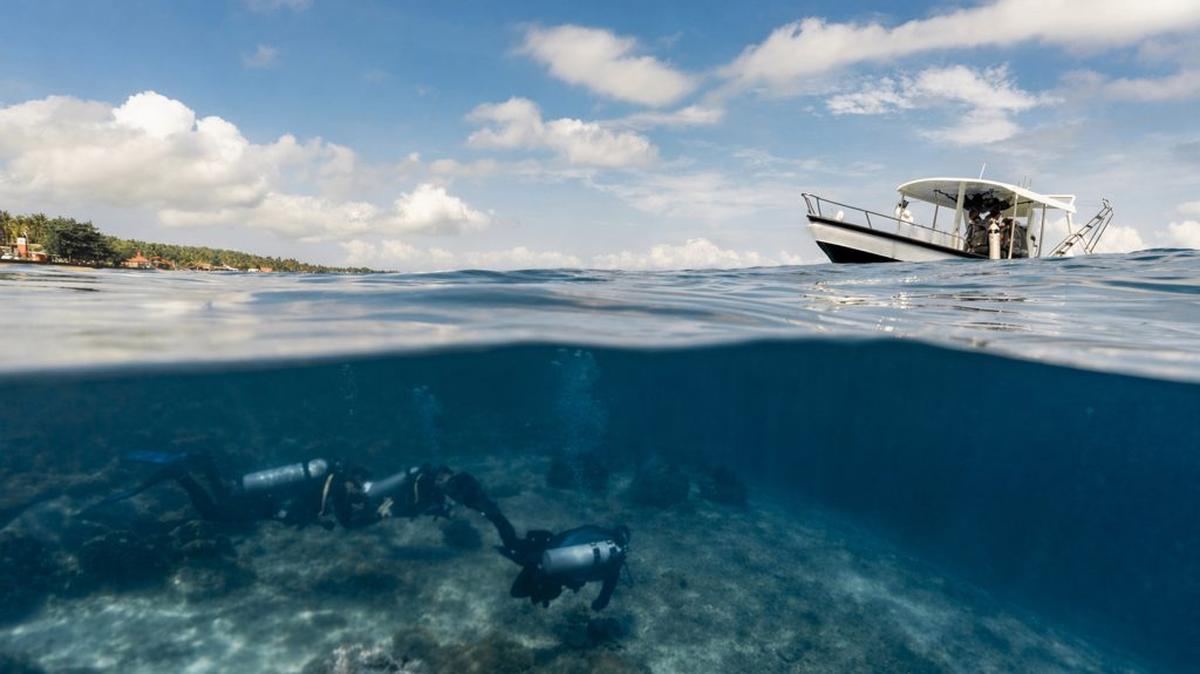 Scuba divers departing for a dive in Nusa Penida, Indonesia. (Dr. Bing Lin via SWNS). 