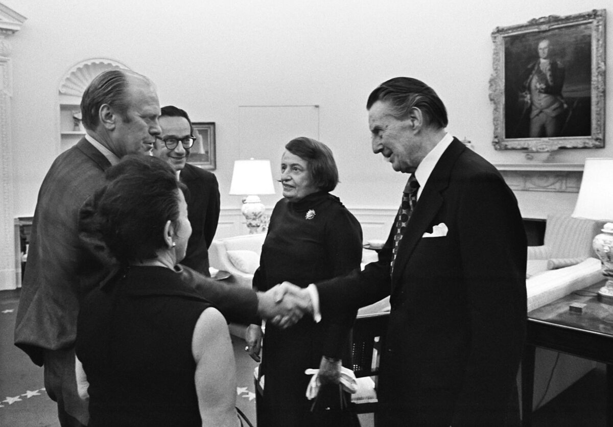  From left, President Gerald R. Ford, Alan Greenspan's mother, Rose Goldsmith, Alan Greenspan, writer Ayn Rand and Rand's husband, Charles Francis ‘Frank' O'Connor, after Greenspan's swearing in as CEA chairman. David Hume Kennerly/The Gerald R. Ford Library/Getty Images 