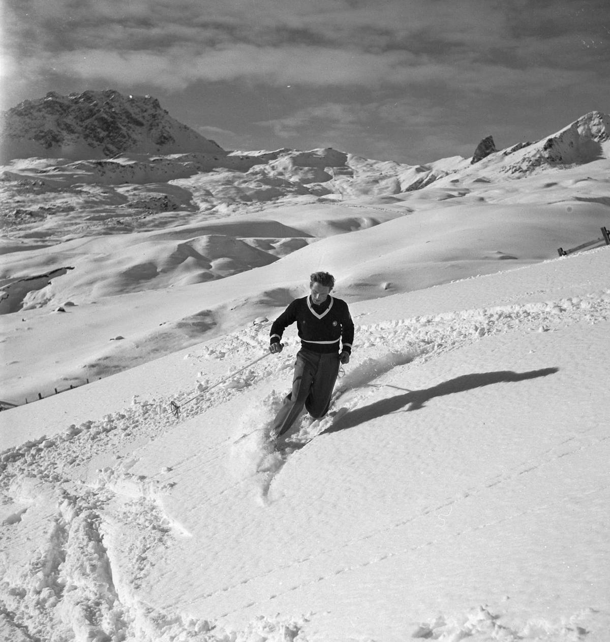  Ski instructor shows the proper way to ski, telemarking, Arosa 1938.