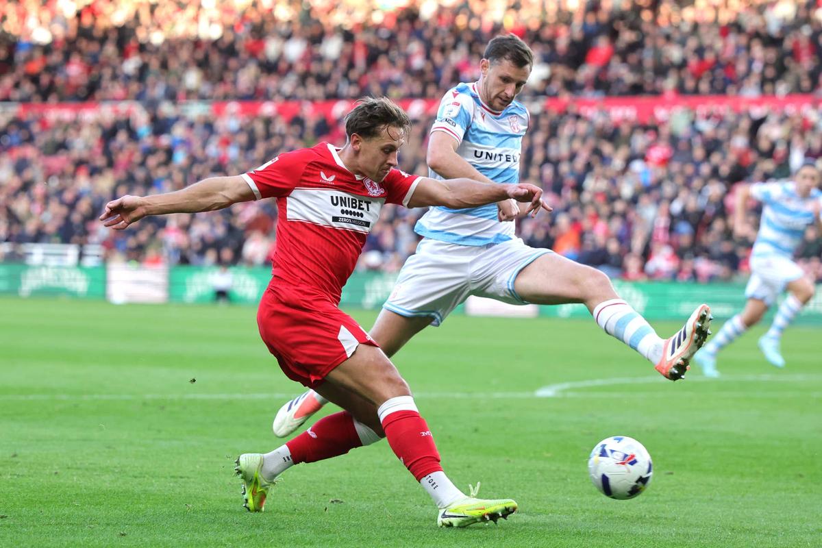  Middlesbrough's Delano Burgzorg (left) and Wrexham's Dominic Hyam battle for the ball during the Sky Bet Championship match at Riverside Stadium, Middlesbrough. Photo by Steve Welsh/PA Images via Getty Images