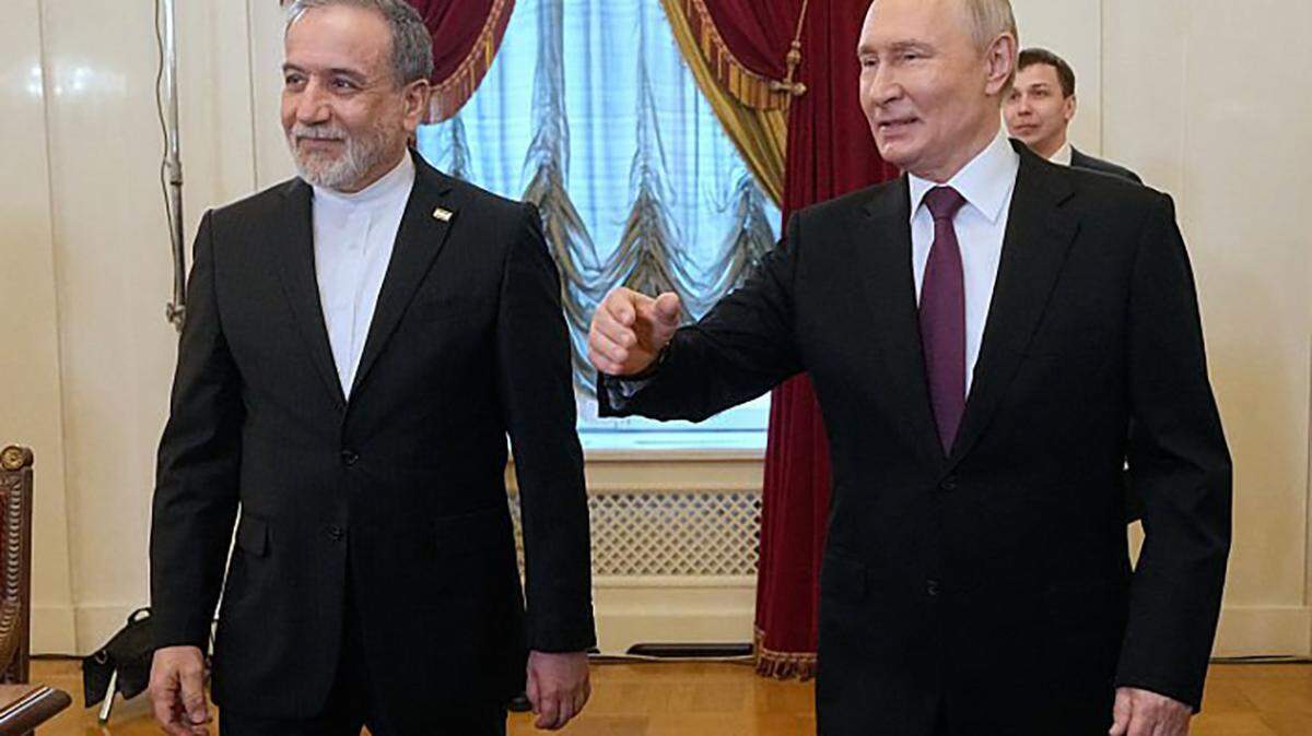Russian President Vladimir Putin meets with Iranian Foreign Minister Abbas Araghchi at the Boris Yeltsin Presidential Library in Saint Petersburg on Monday.