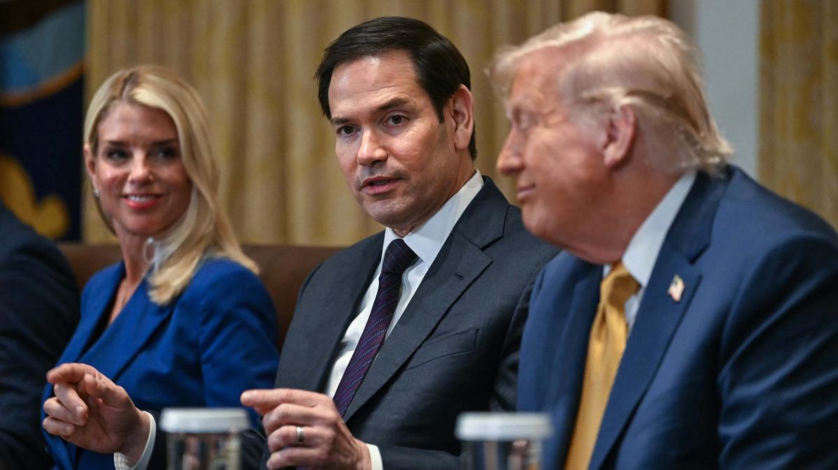 U.S. Secretary of State Marco Rubio, center, speaks as President Donald Trump and Attorney General Pam Bondi look on during a cabinet meeting in the Cabinet Room of the White House in Washington, D.C., on July 8, 2025. (Andrew Caballero-Reynolds/AFP/Getty Images/TNS)